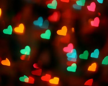 A series of Christmas lights in the shapes of hearts.