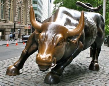 The bull statue that can be seen at Wall Street in New York City. It is seen facing the camera.